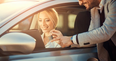 woman sitting in rental car