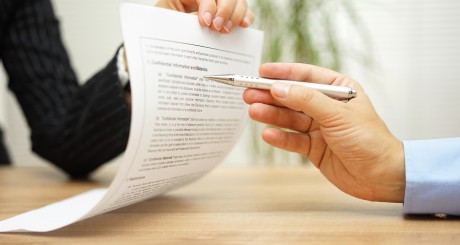 agent and customer reviewing insurance documents