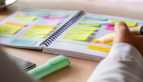 planner with sticky notes